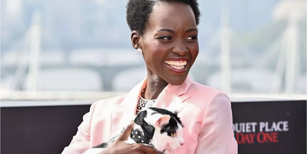 Lupita Nyong’o Trades Her Cat Purse for a Real Cat on the Red Carpet