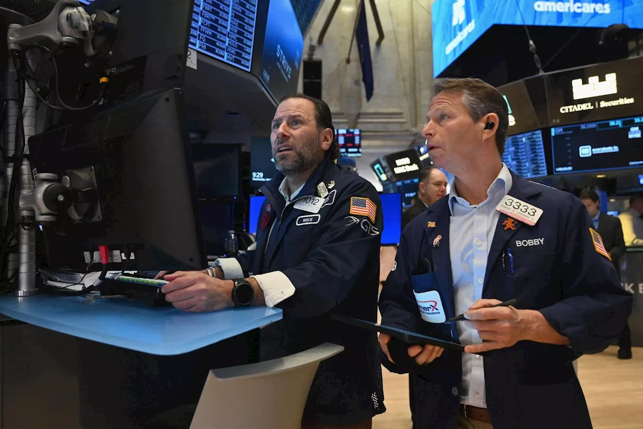 Wall Street termine en hausse, encouragée par la Fed