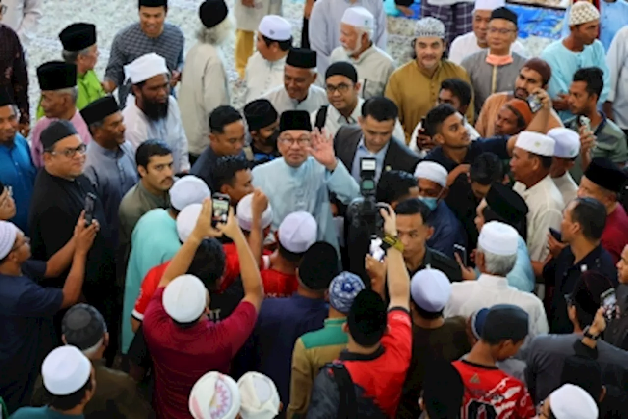 PM Anwar performs Friday prayers at Kg Sungai Merab Mosque in Kajang