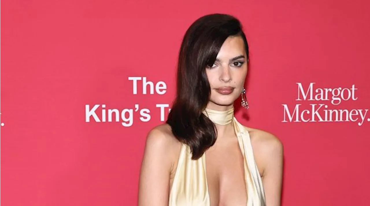 Emrata's Deep Neckline Goes Down Her Stomach