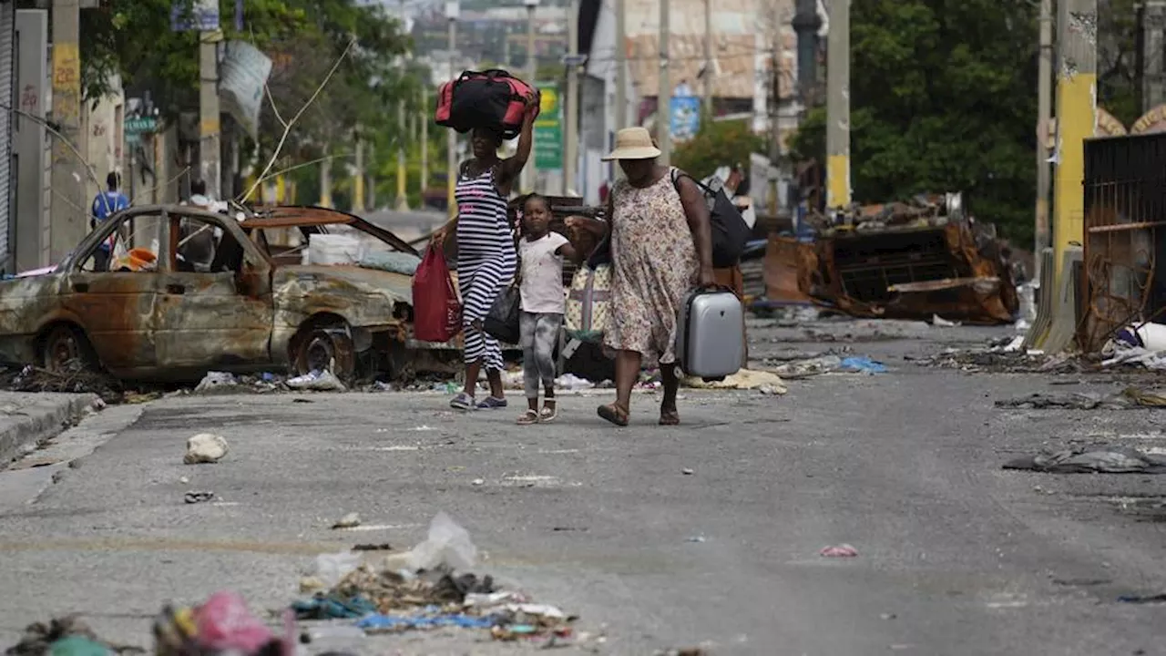 Haiti gangs besiege Port-au-Prince areas days after new PM takes charge