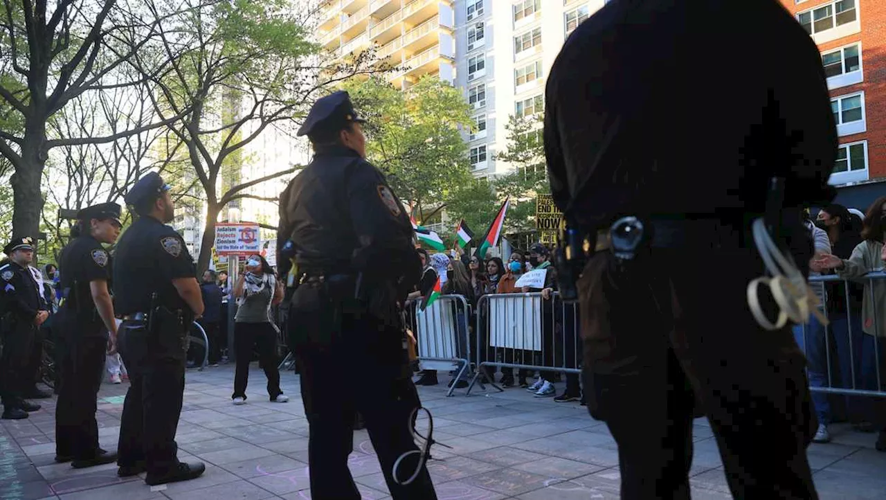 Police officer fired gun while clearing protesters from Columbia building, prosecutors say