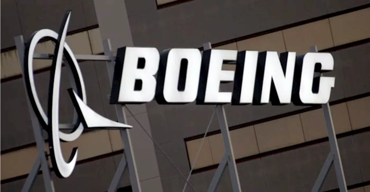 Boeing threatens to lock out its private firefighters around Seattle in a dispute over pay