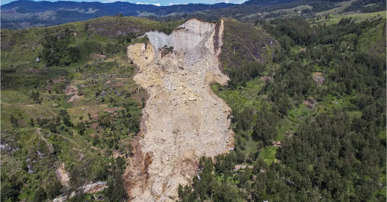 Papua New Guinea landslide survivors slow to move to safer ground after hundreds buried