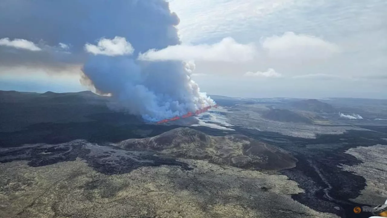 Iceland volcano spews lava and smoke for a second day