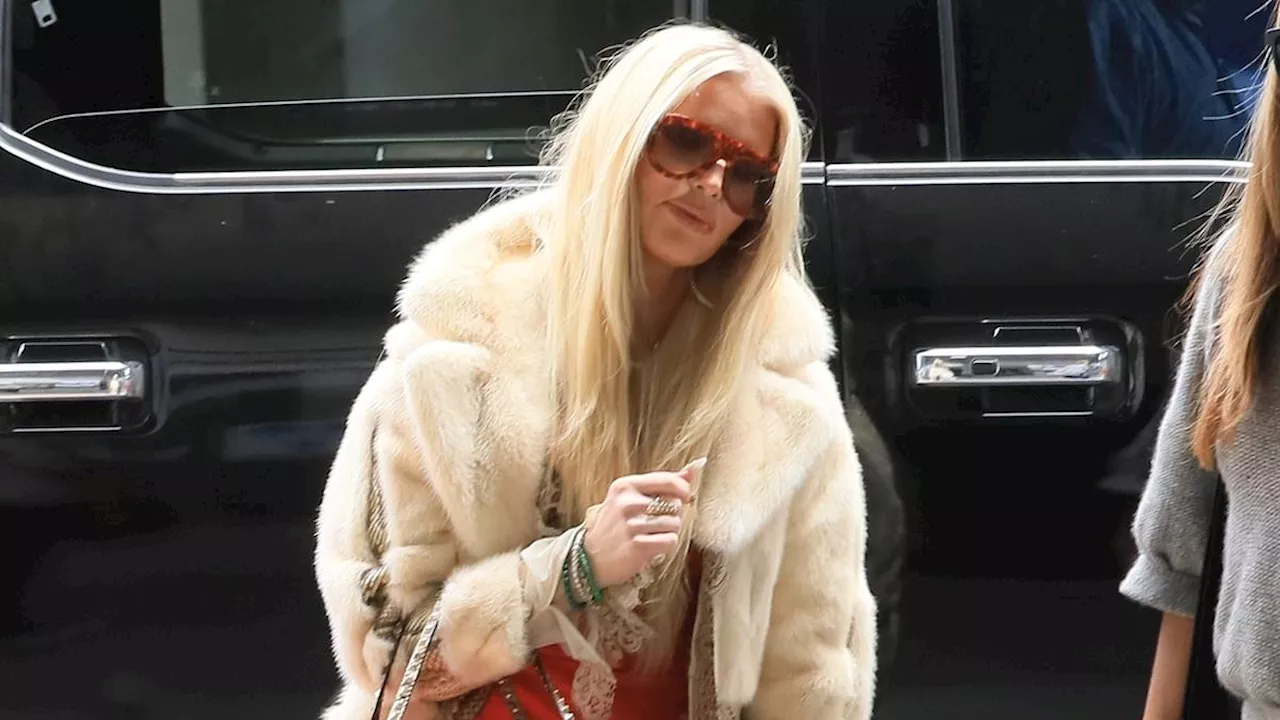 Jessica Simpson looks thinner than ever in a vintage faux fur coat while catching a flight out of...