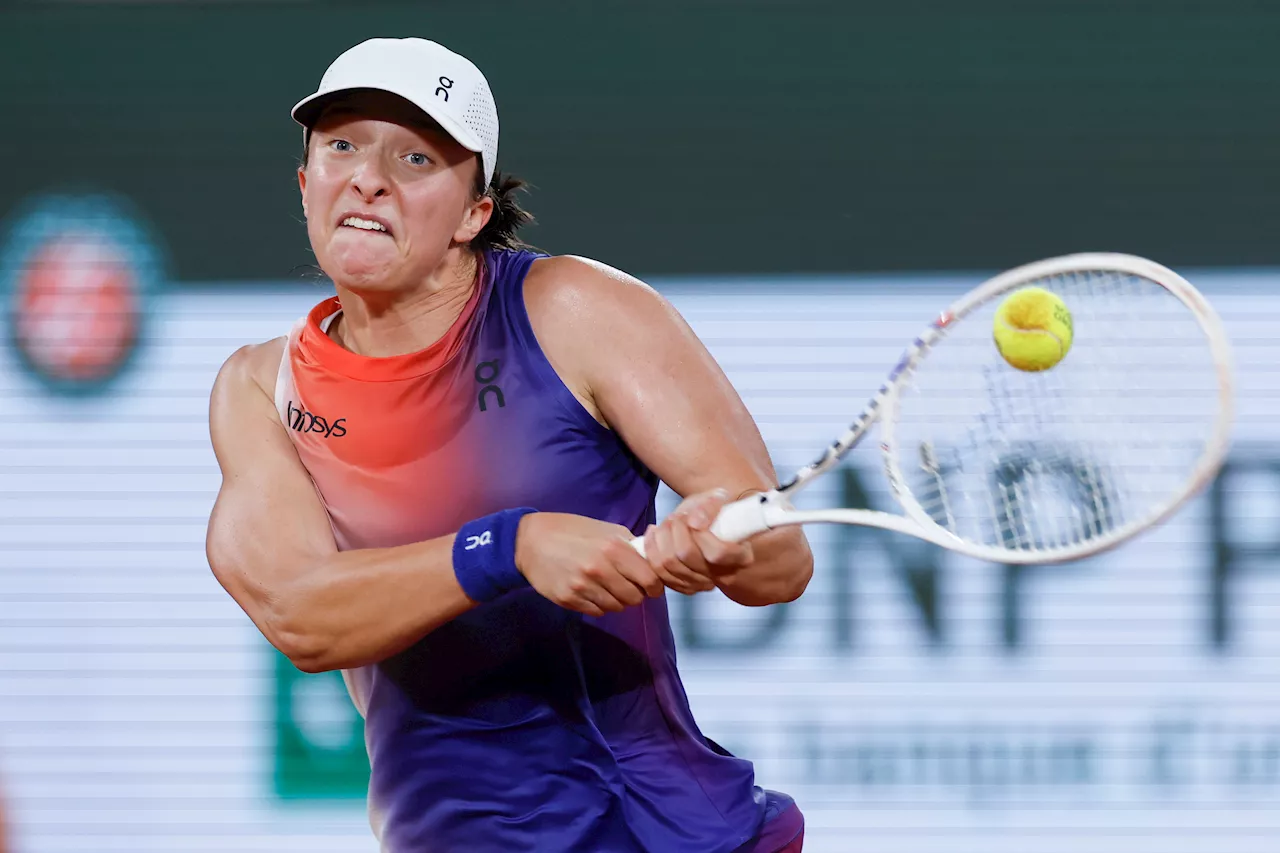 Swiatek saves match point, comes back to sneak past Osaka at French Open