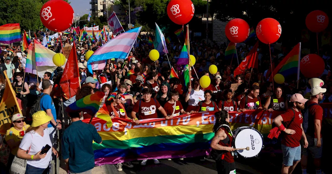 Thousands march in a subdued Jerusalem gay pride parade