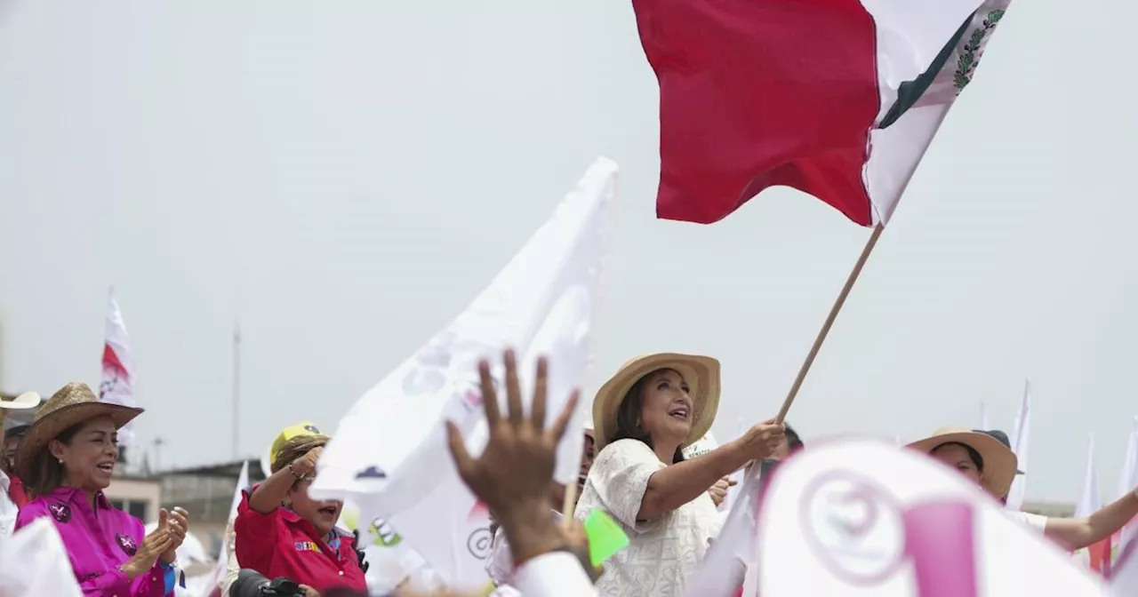 A violent, polarized Mexico goes to the polls to choose between 2 women presidential candidates