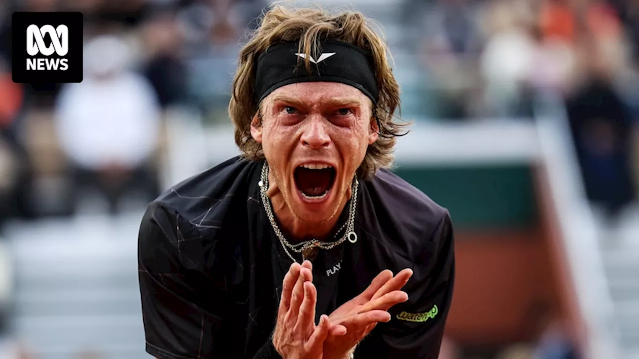 Andrey Rublev smashes his racquet into his knee in explosive scenes at the French Open