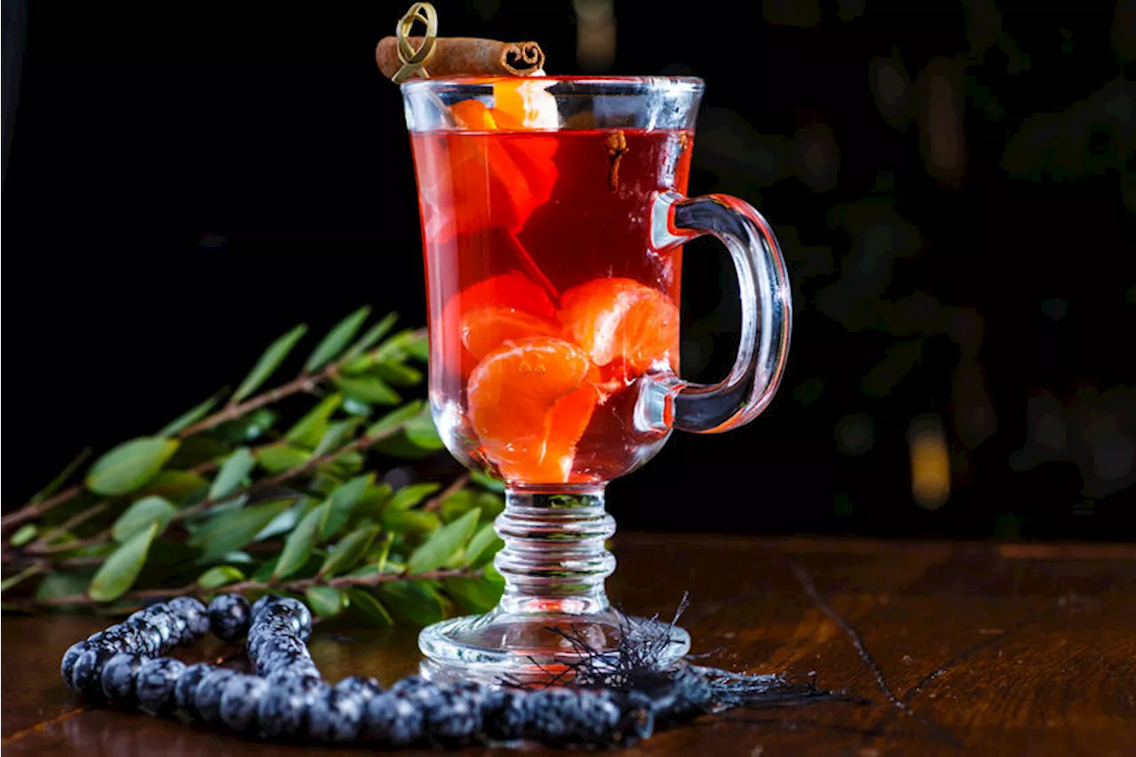 Mulled pear and cranberry punch cocktail