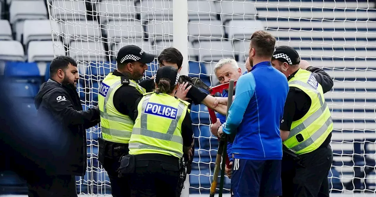 Pro Palestine protester chains himself to Hampden goal