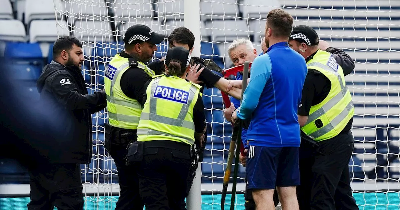 Palestine protestor chains himself to Hampden goal as Scotland vs Israel delayed