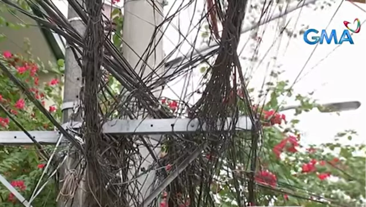 Utility firms back bill to clear 'spaghetti wires'