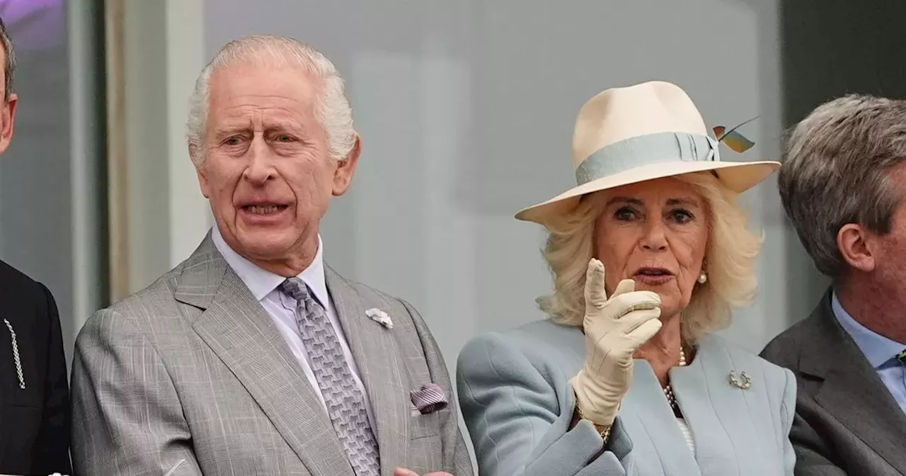 King Charles and Queen Camilla beam as they make surprise visit to Epsom races