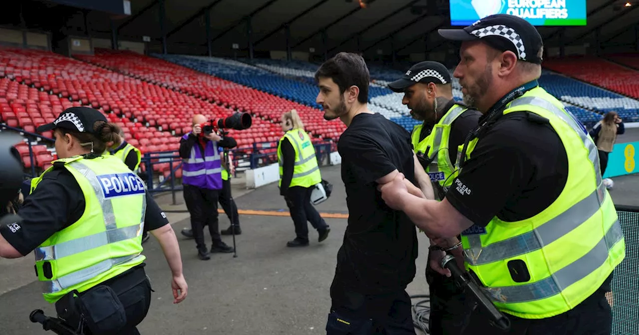 Soccer-Protesters rally outside Hampden Park before Israel women's match