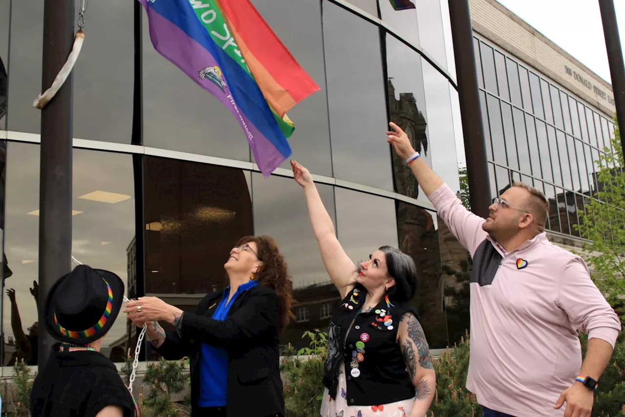 Pride Month launches with flag raising at city hall