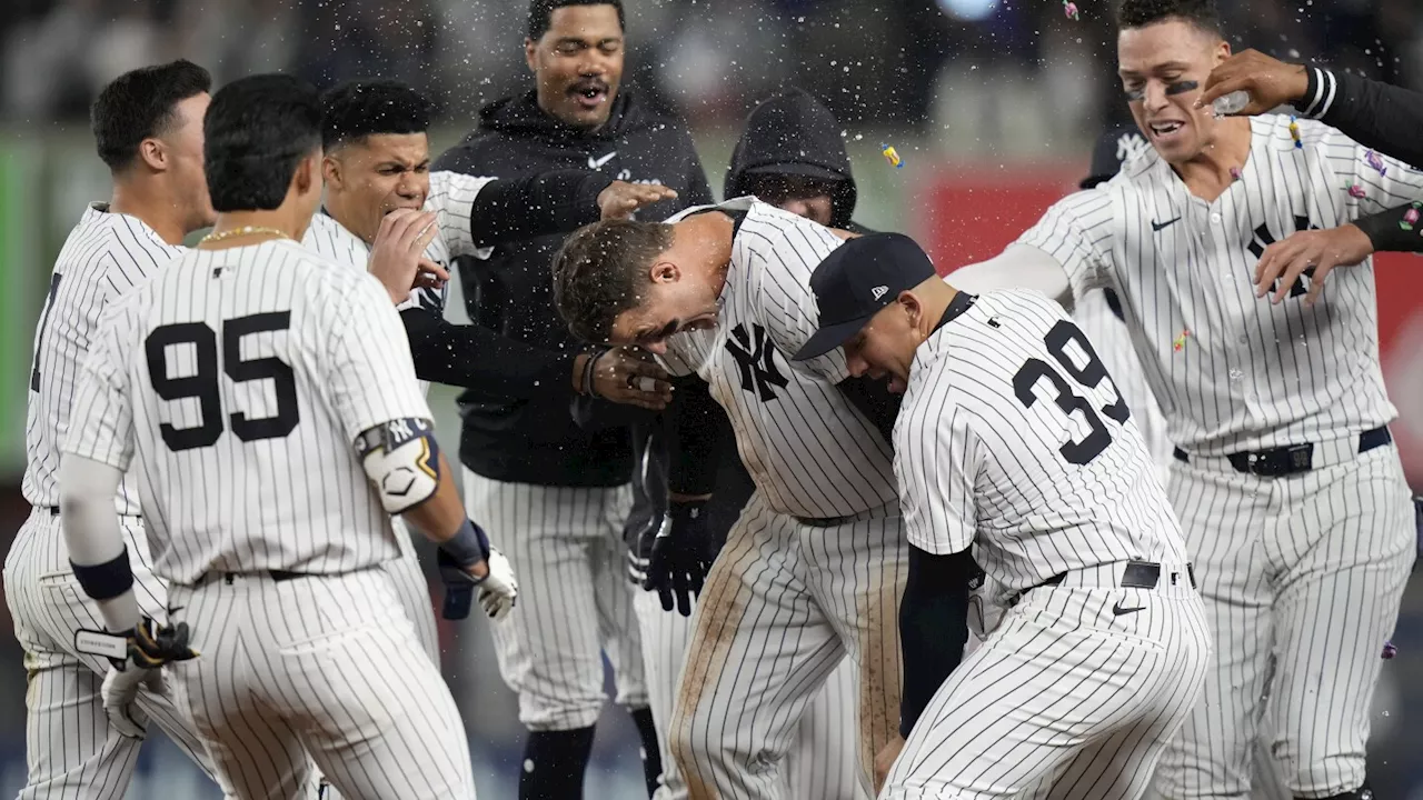 Yankees score two in the ninth to beat Tigers 2-1