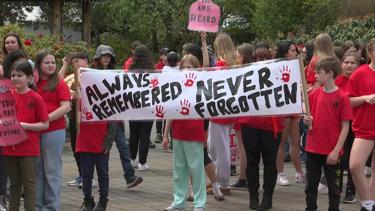 Students participate in Red Dress Day ceremony in Langford