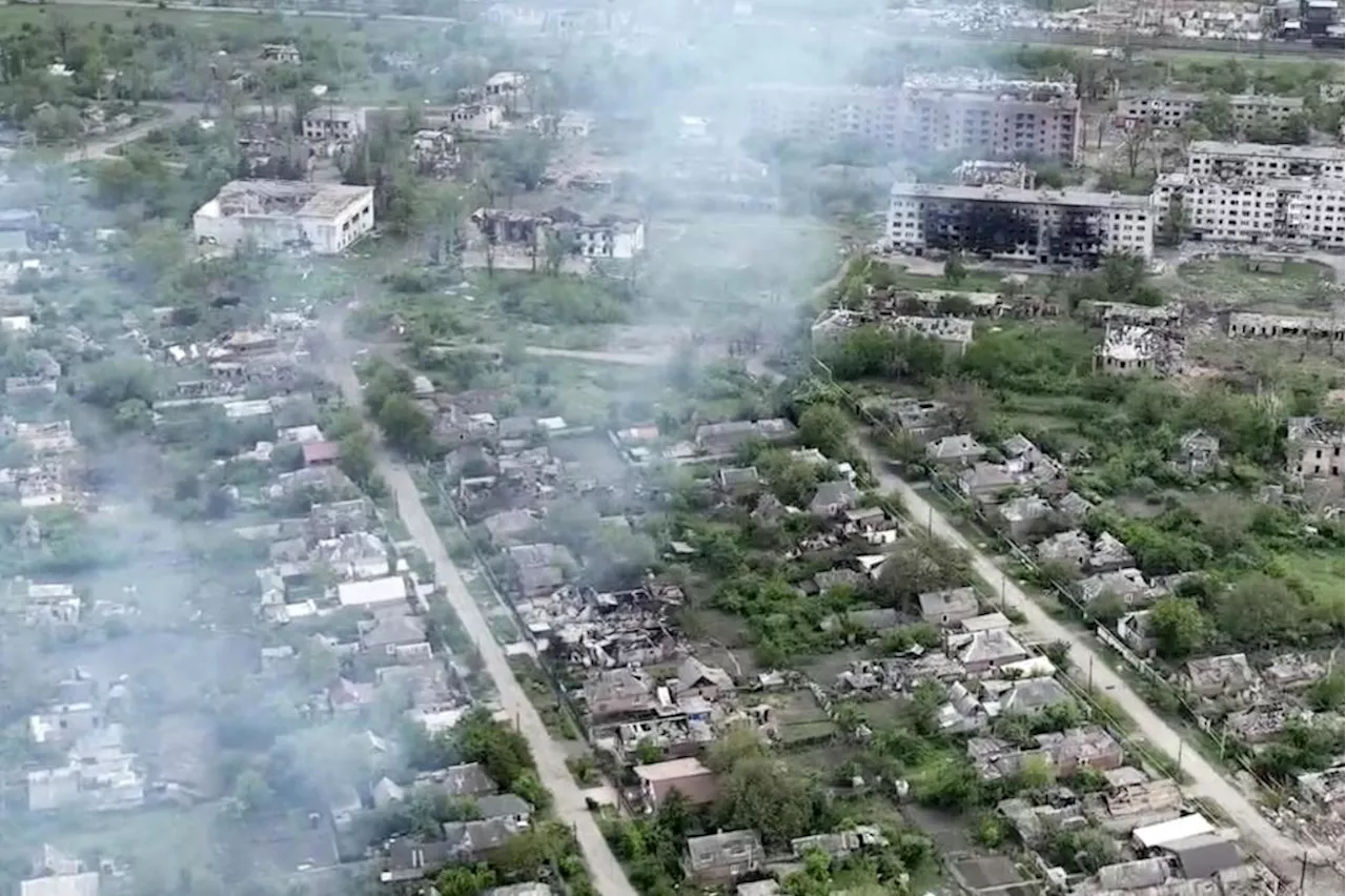 Drone footage shows Ukrainian village battered to ruins as residents flee Russian advance