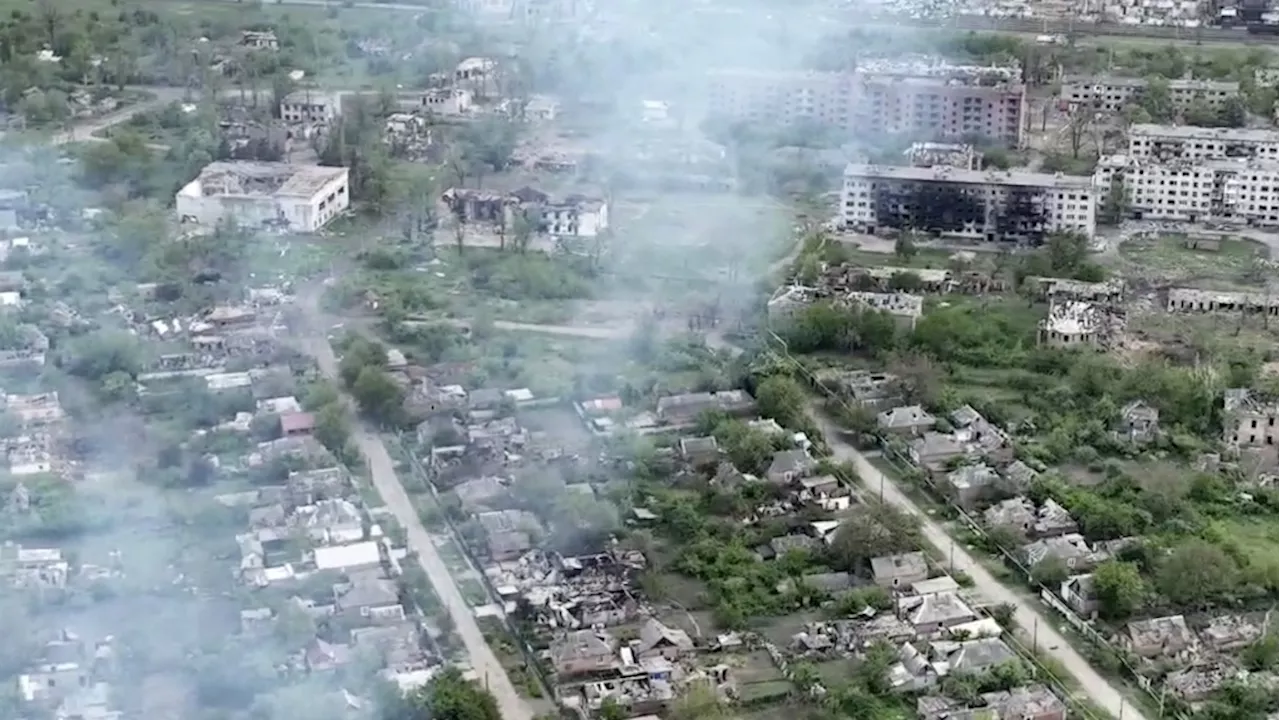 Drone footage shows Ukrainian village battered to ruins as residents flee Russian advance