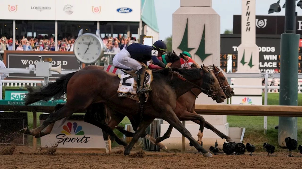 Mystik Dan wins the 150th Kentucky Derby at Churchill Downs in a three-horse photo finish