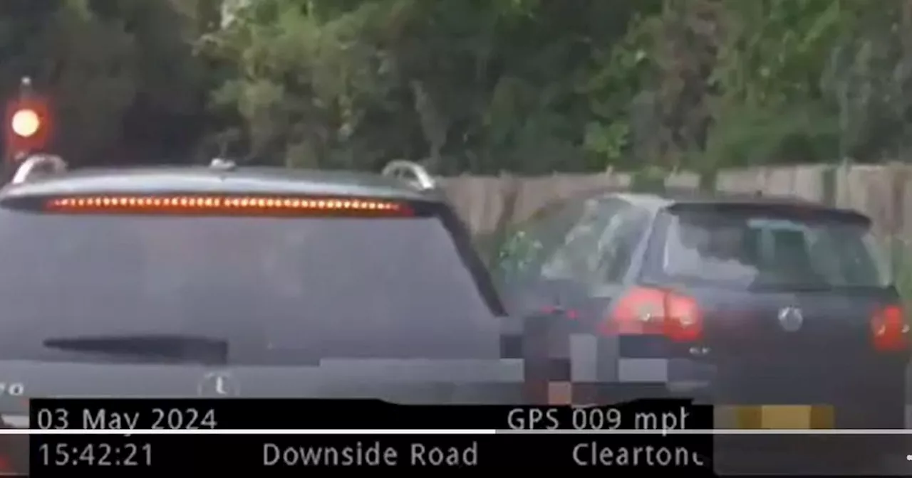 Moment driver runs a red light - right in front of an unmarked police car
