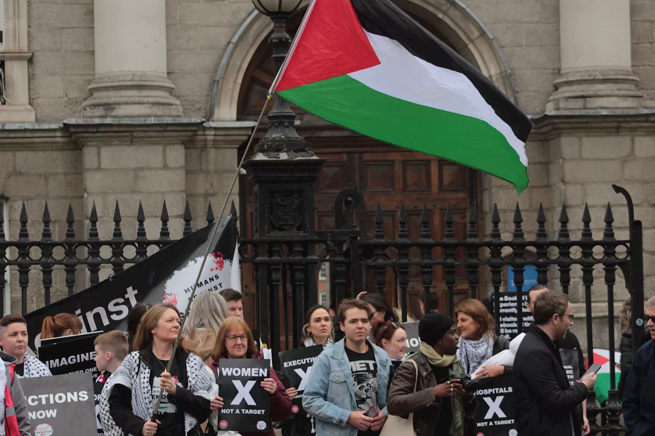 Protestors gather outside Trinity in support of Book of Kells encampment