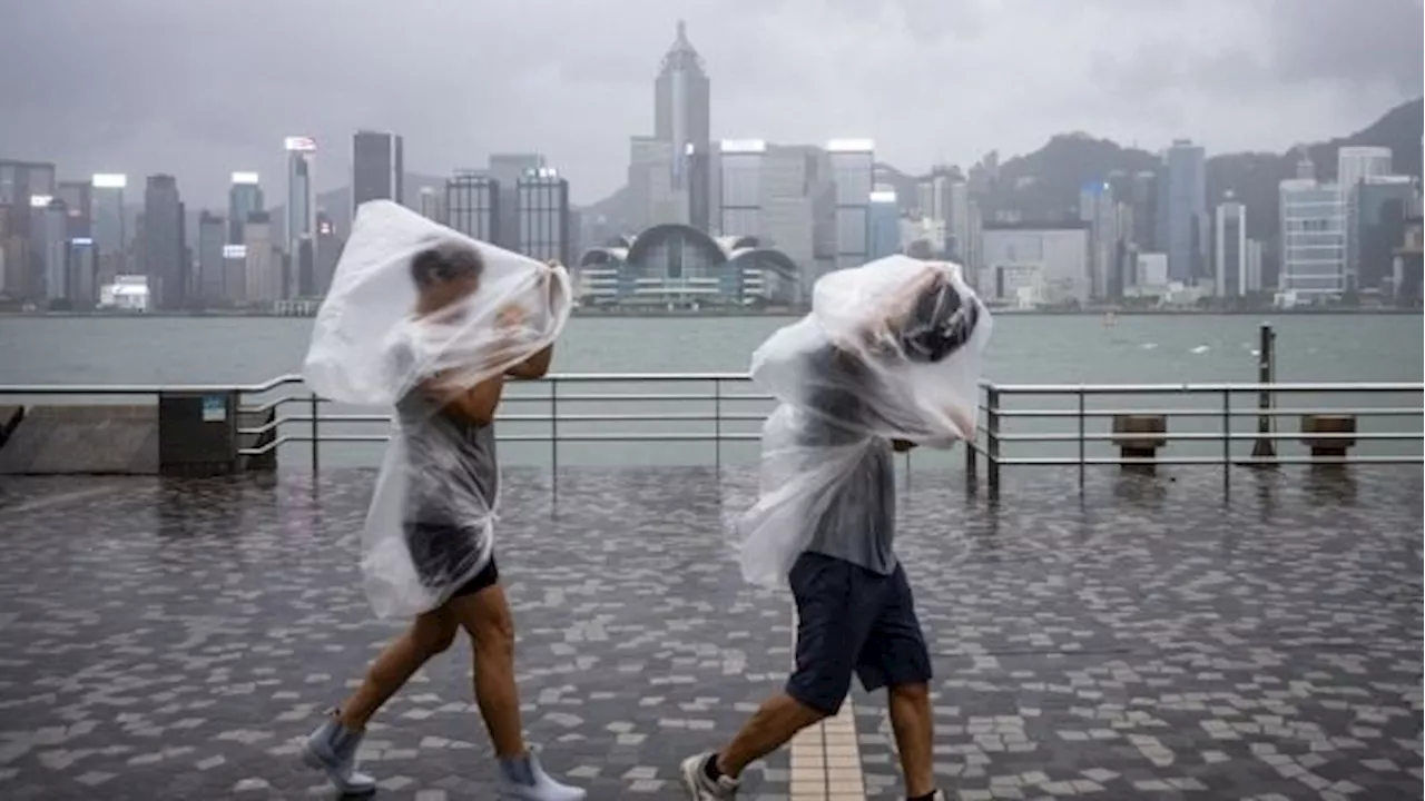 Hong Kong issues first Red Storm signal of the year as roads get flooded