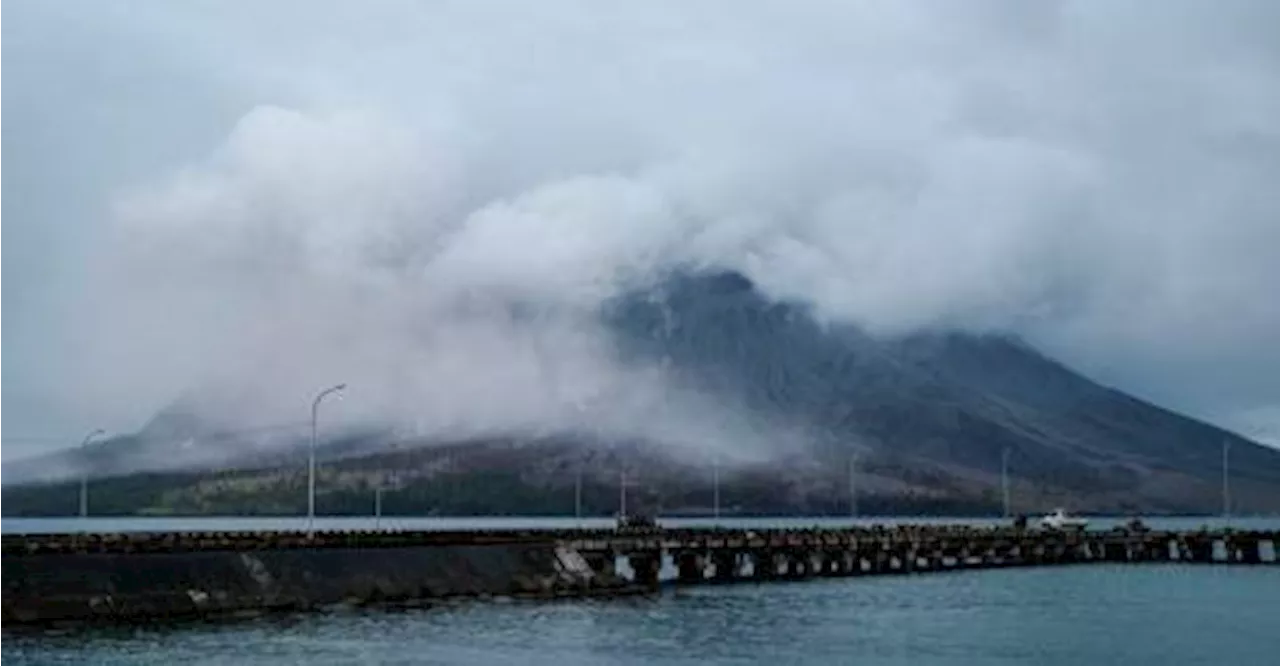 Indonesia’s Mount Ruang emits smoke, airport closure extended