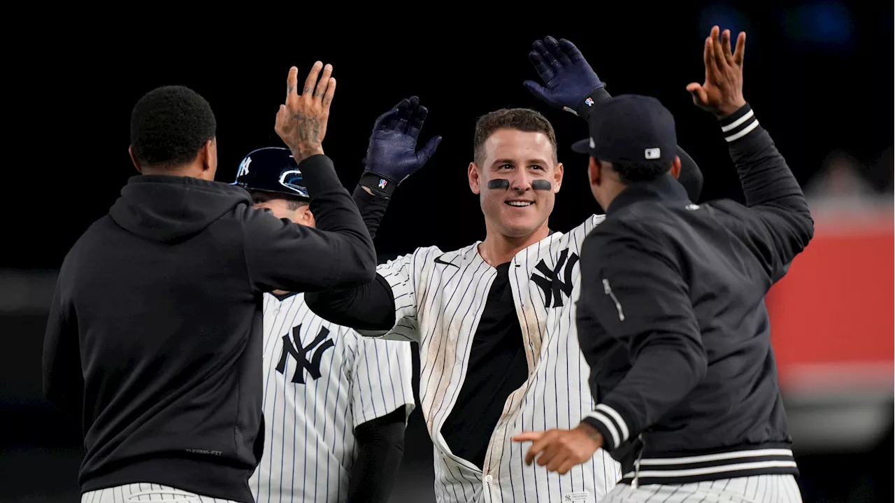 Stanton, Rizzo help Yankees rally in ninth for victory over Tigers