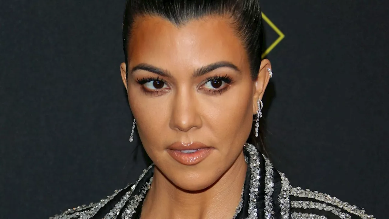 Kourtney Kardashian's son sports edgy nail polish in new family photo alongside rarely-seen brother