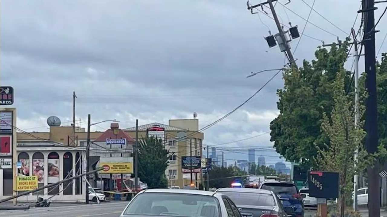 Downed powerlines cause street closure on Aurora Ave North