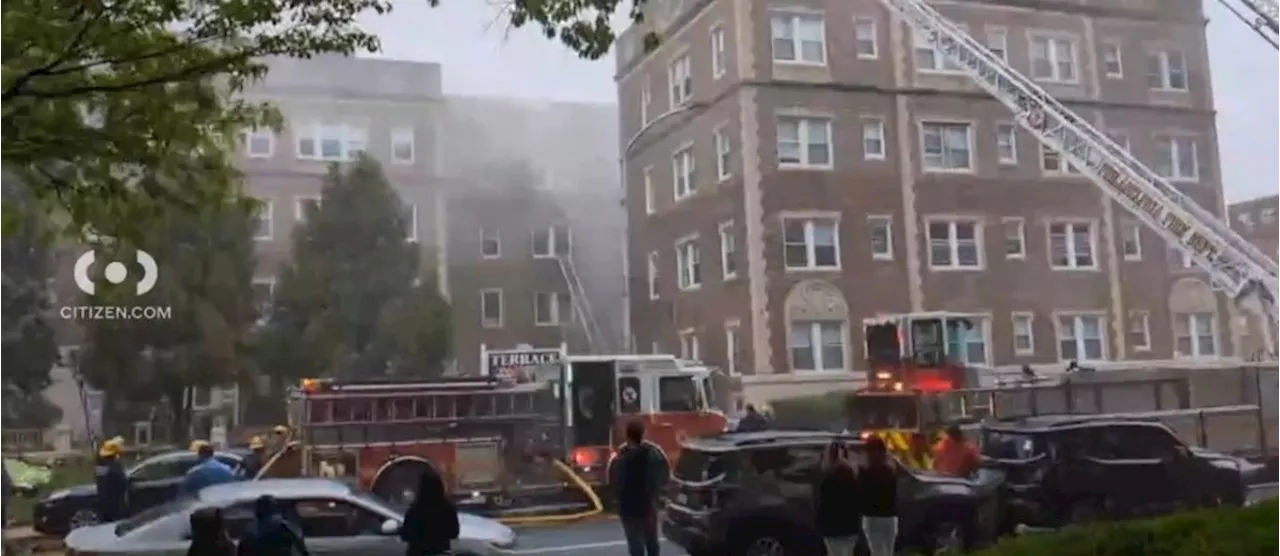 More than 100 residents displaced after an apartment building fire in Walnut Hill