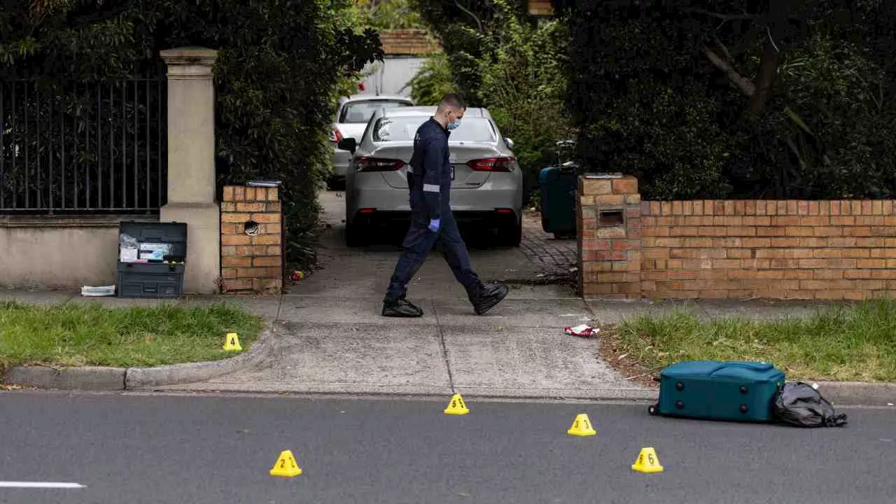 Police reveal identities of two men they are hunting after fatal Melbourne stabbing