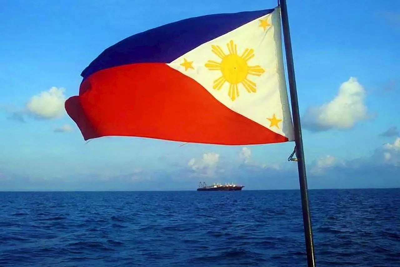 Philippines says it won't raise South China Sea tensions, won't use water cannons