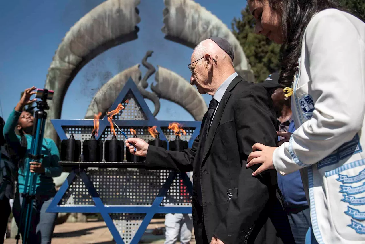 ‘Never give up hope’: Holocaust survivors light candles on remembrance day