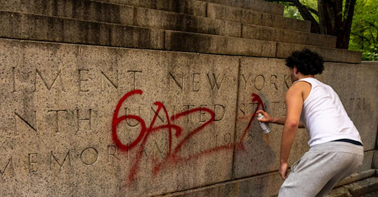 Protesters Drape Palestinian Flag Around NYC Memorial, Burn American Flag