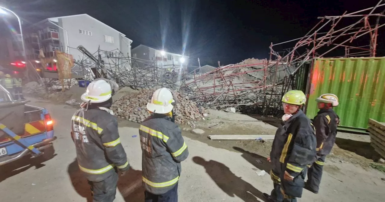 George building collapse: Marathon rescue operation to save trapped construction workers continues