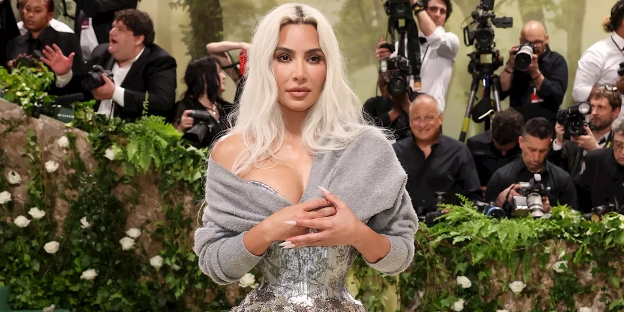 Kim Kardashian Shines in a Silver Floral Corset Gown at the 2024 Met Gala