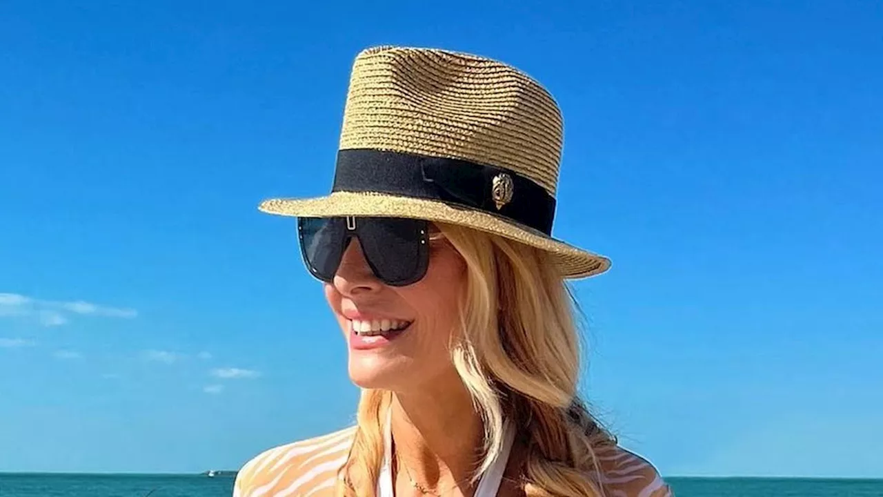 Tess Daly, 55, is a bronzed beach babe in dazzling array of bikinis