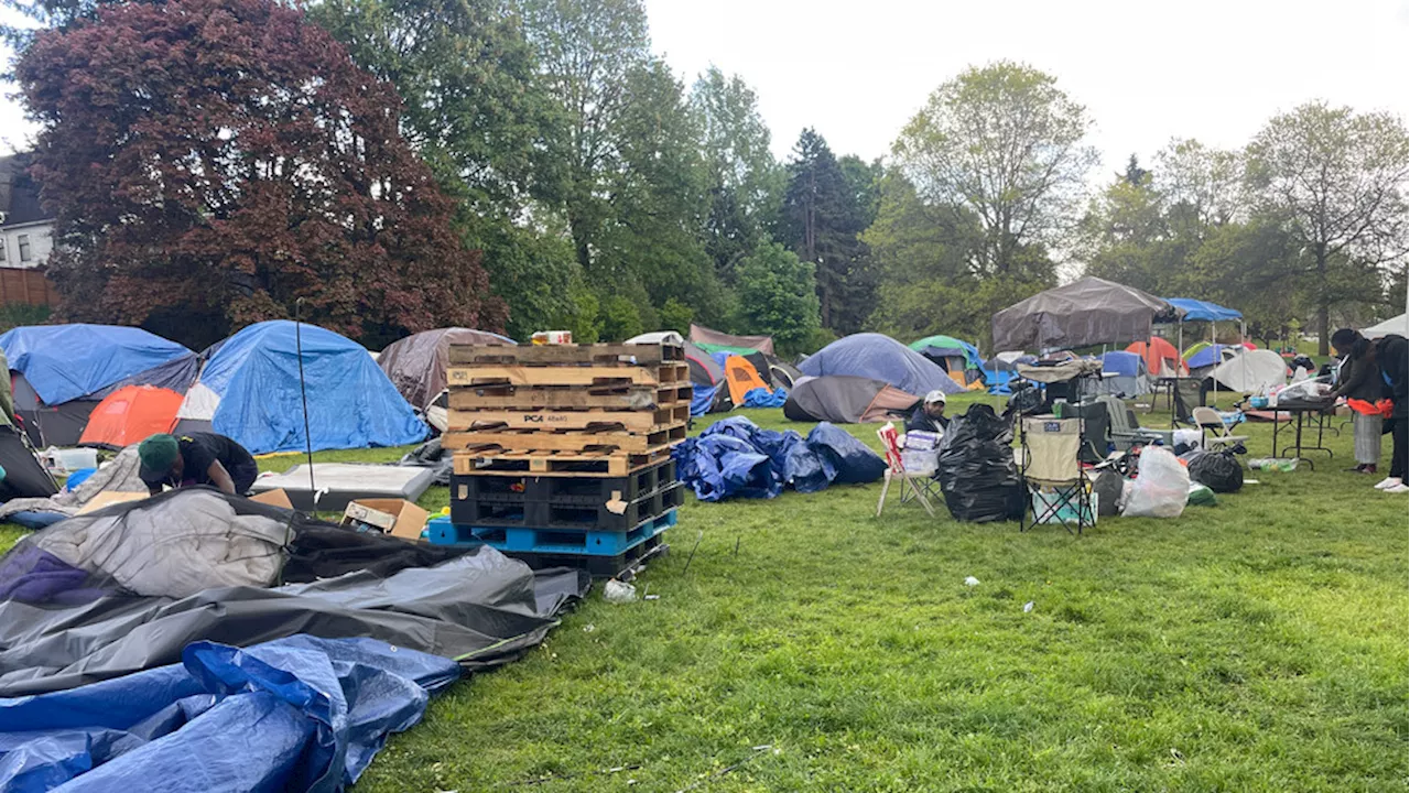 Migrants move from Seattle park to Kent hotel while seeking housing solutions