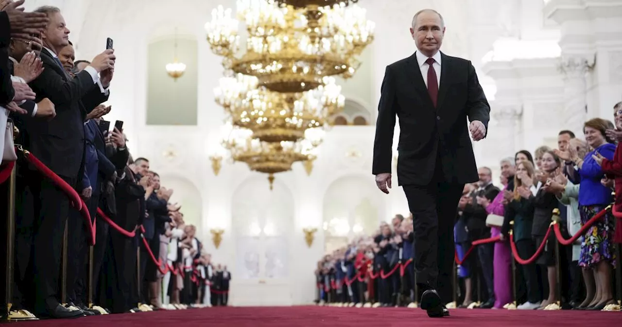 Vladimir Putin begins a fifth term as Russian president in an opulent Kremlin inauguration