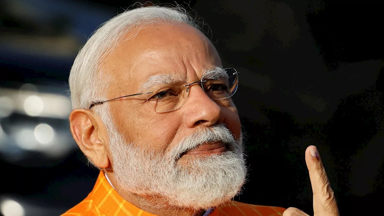 India election: Narendra Modi casts vote as fears grow among the country's Muslims