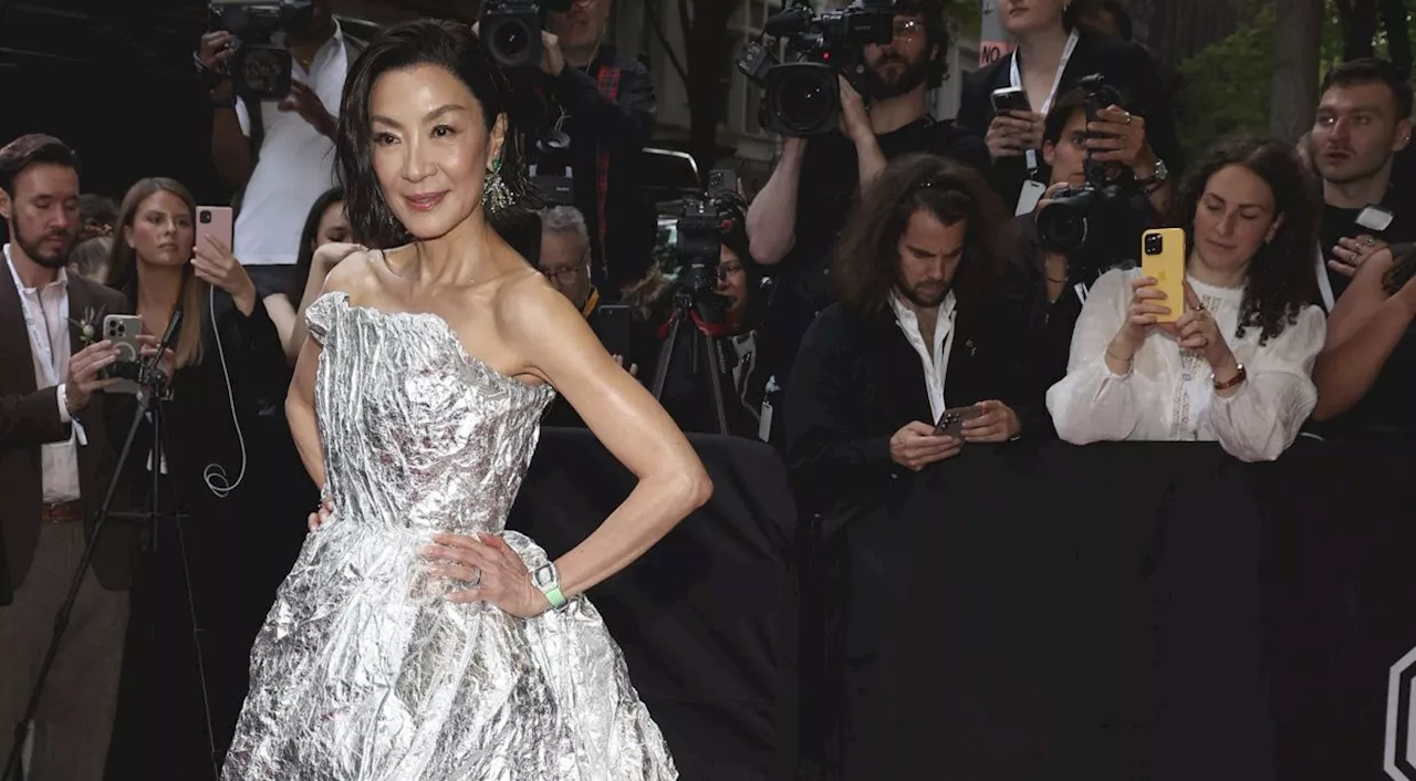 2024 Met Gala: Michelle Yeoh walks red carpet in shiny 'tin foil' dress