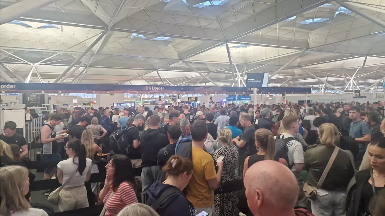 Travel chaos at UK airports as passengers stuck in ‘huge’ queues after Border Control ‘IT glitch’...