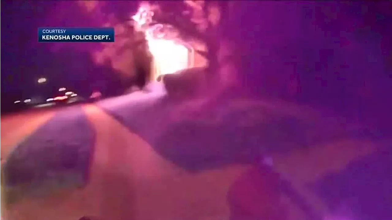 WATCH: Passerby and Wisconsin police officers rescue man from fire