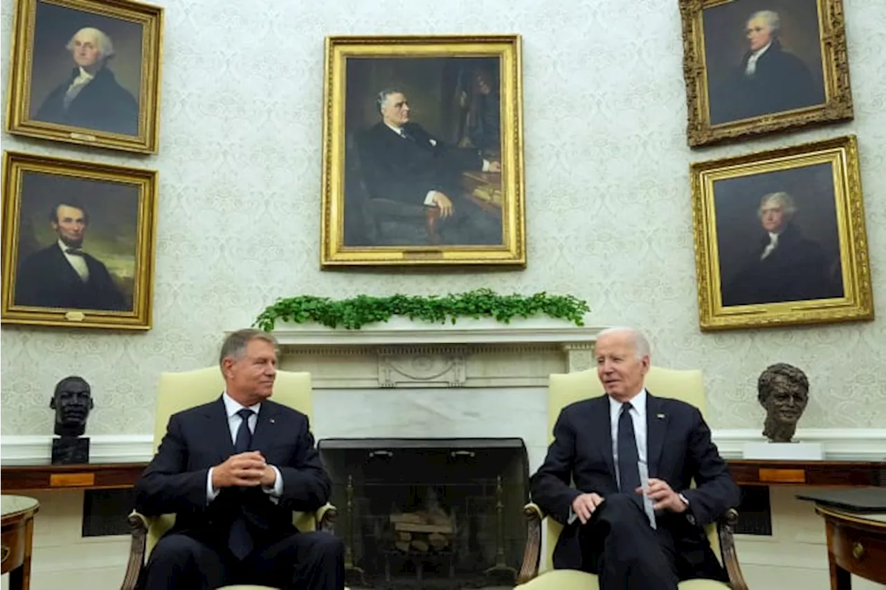 Biden hosts Romanian leader at the White House to celebrate NATO partnership