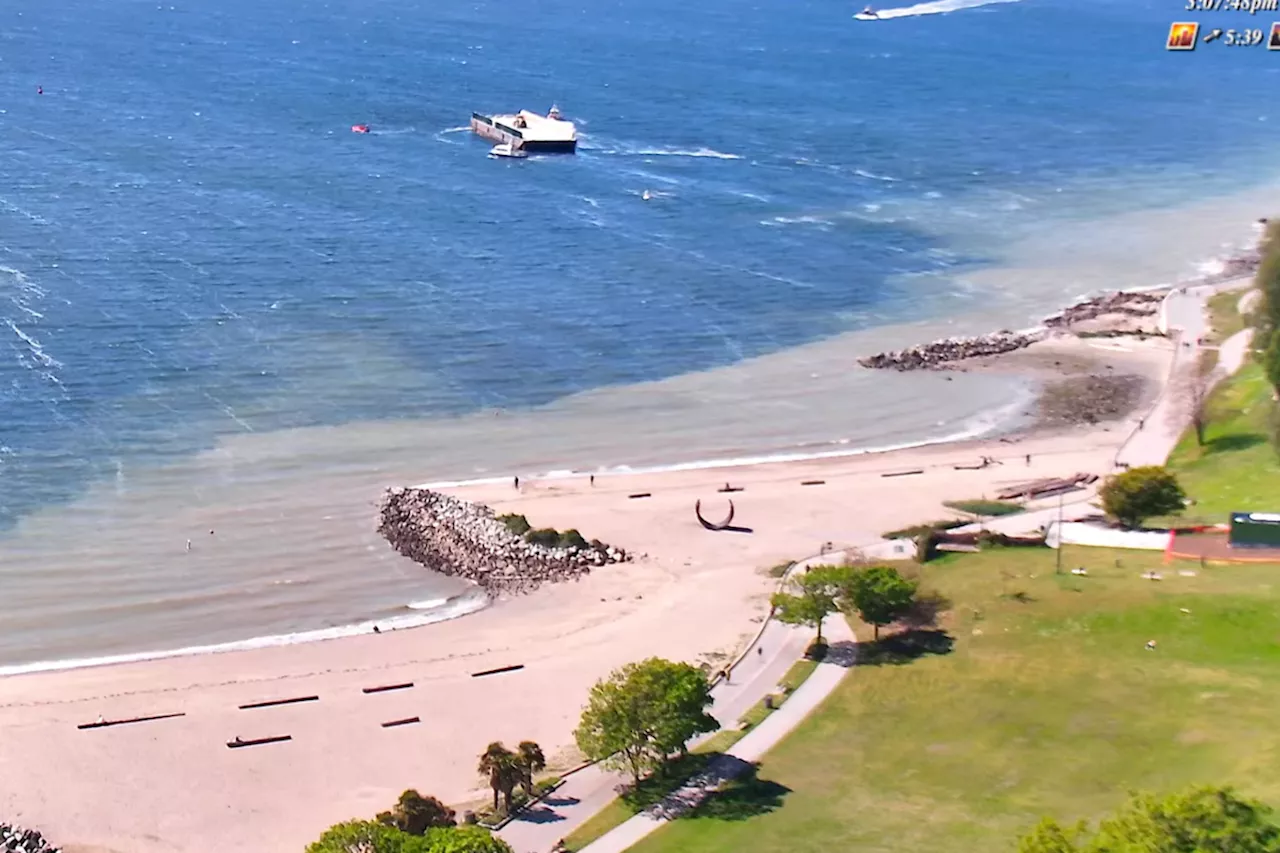 Another barge just about drifted from English Bay onto a beach