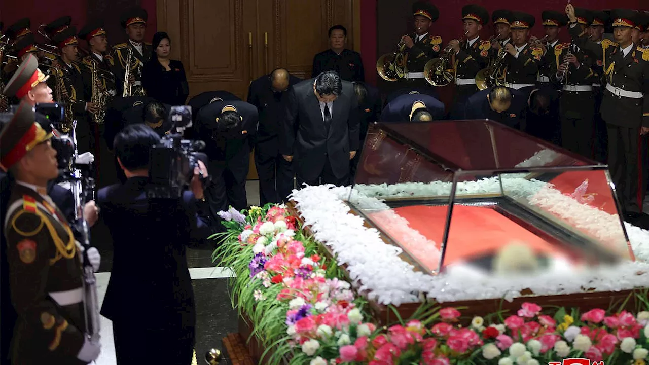 Kim Jong Un bows before the man who made him a god